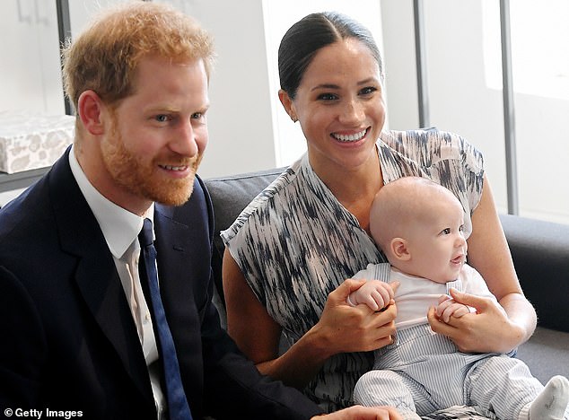 Meghan and Harry pictured with Archie during a tour of South Africa in September 2019